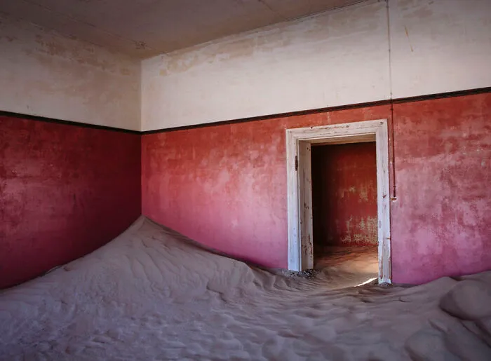 ‘Sand Castles’: 21 Surreal Photos Of Desert Sand Swallowing Abandoned Homes By Emma McEvoy