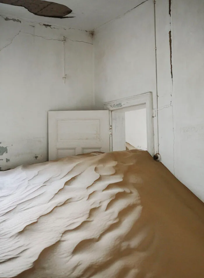 ‘Sand Castles’: 21 Surreal Photos Of Desert Sand Swallowing Abandoned Homes By Emma McEvoy