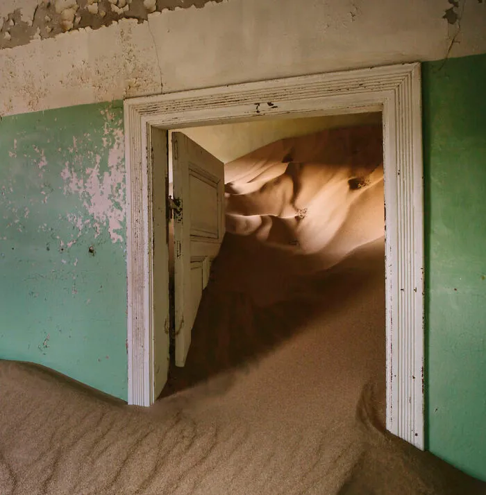 ‘Sand Castles’: 21 Surreal Photos Of Desert Sand Swallowing Abandoned Homes By Emma McEvoy