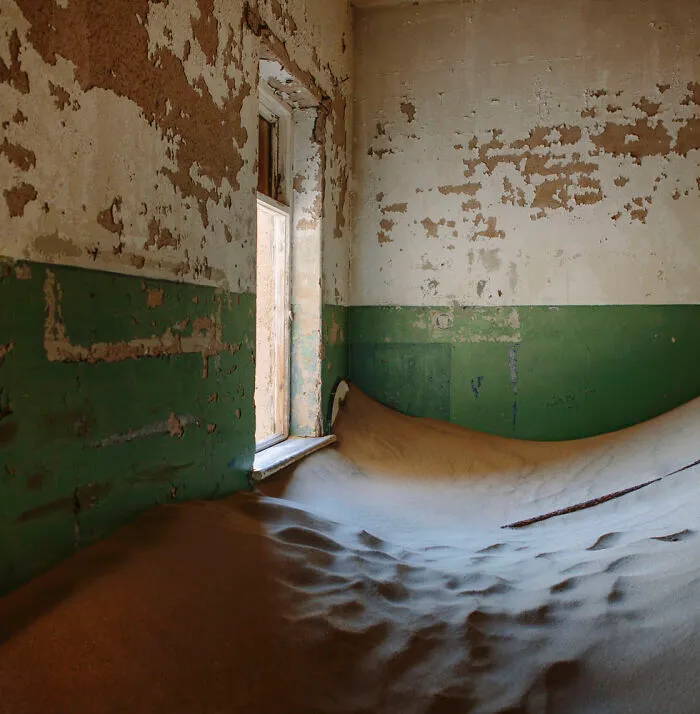 ‘Sand Castles’: 21 Surreal Photos Of Desert Sand Swallowing Abandoned Homes By Emma McEvoy