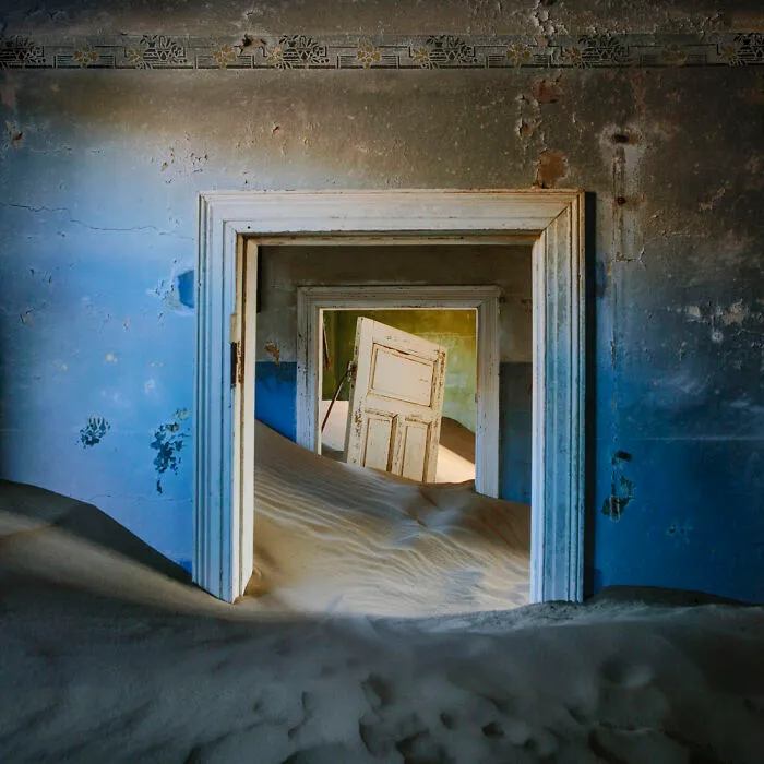 ‘Sand Castles’: 21 Surreal Photos Of Desert Sand Swallowing Abandoned Homes By Emma McEvoy