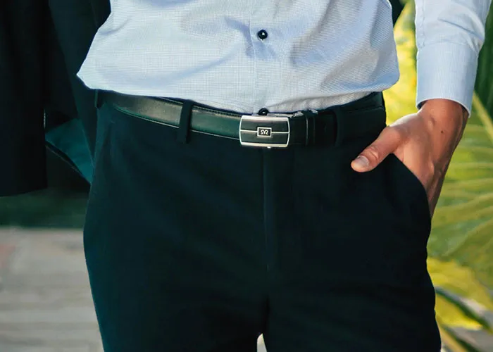 Man in business attire with hand in pocket, illustrating subtle confidence and loopholes used against horrible bosses.