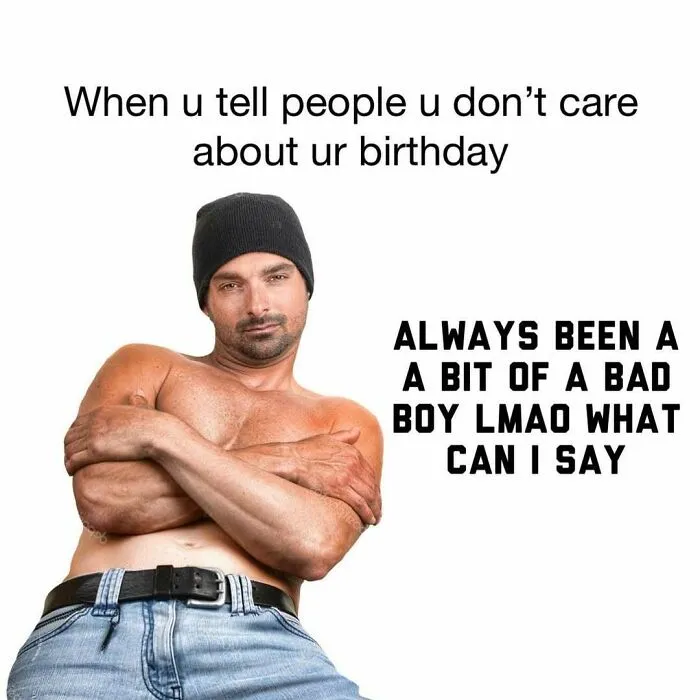 Shirtless man wearing a beanie with arms crossed, humorously embodying alpha male stereotypes in a funny post.