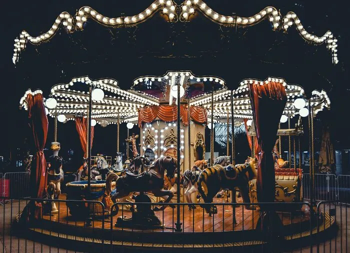 Would you rather be paid to walk through an abandoned carnival at midnight or explore an old, empty hospital with flickering lights and a horrible past?