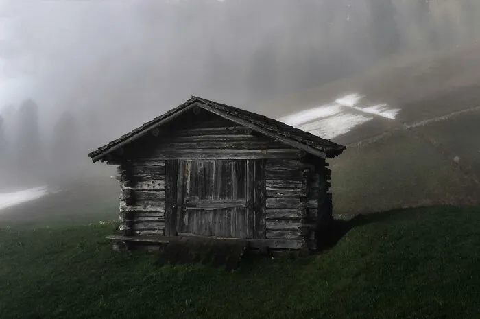Would you rather stay in a cabin that’s silent except for whispers outside or one that hums with faint lullabies through the night?