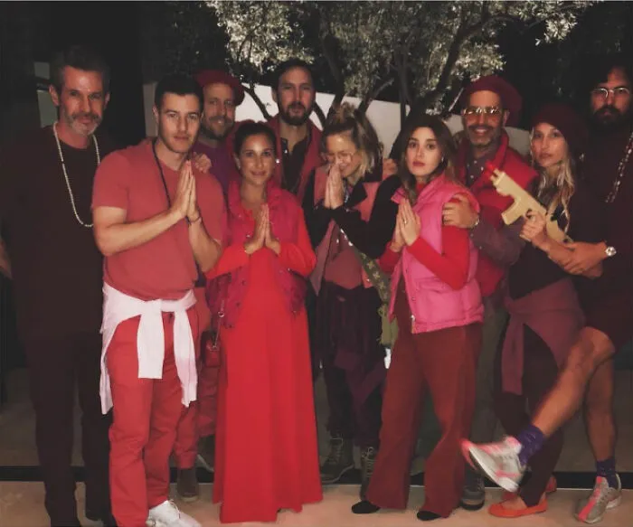 Kate Hudson And Her Friends Dressed In Costumes Inspired By The Rajneeshee Movement