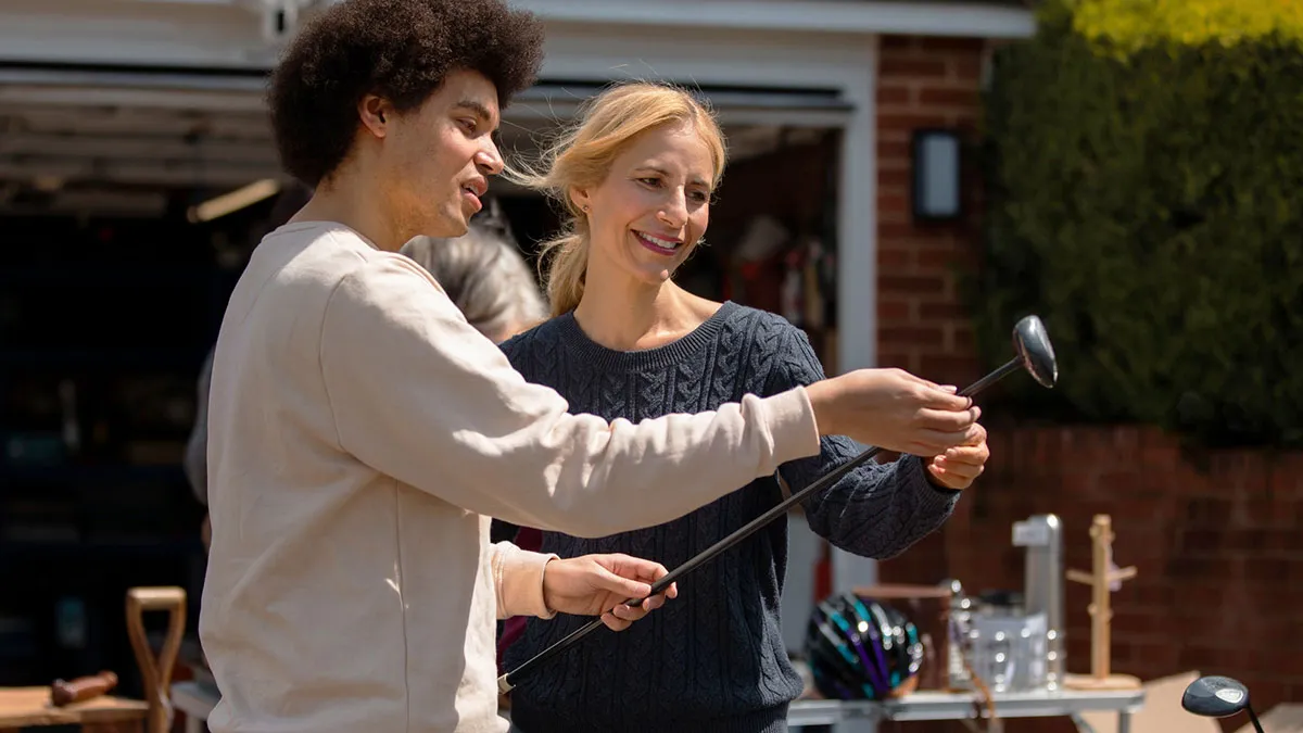 Yard Sale Shopper Overhears A Man Trying To Lowball A Widow, Steps In To Tell Her The Real Worth