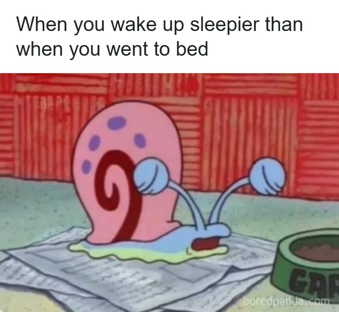 Cartoon snail looking tired and sleepy on a newspaper illustrating relatable anxiety coping meme.