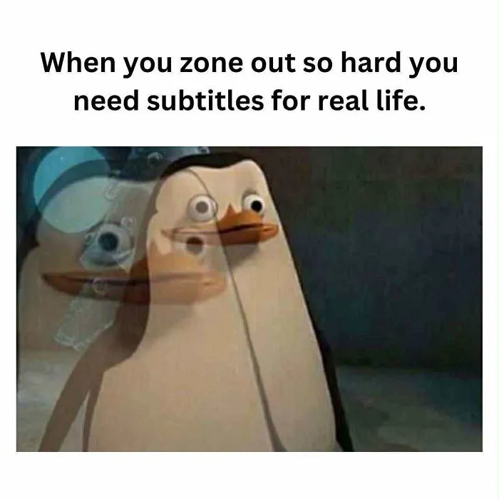 Penguin meme showing zoning out with blurry overlapping effect, illustrating relatable anxiety coping humor.