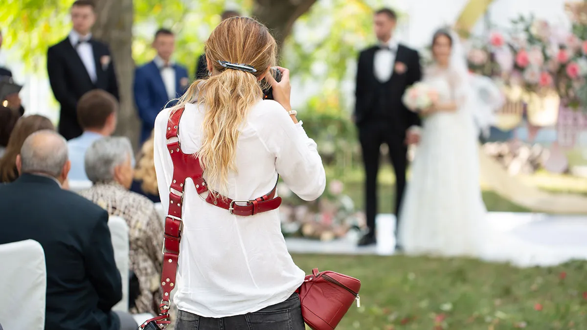 Woman Refuses To Film Husband’s Coworker’s Wedding For Free, Gets Dragged For It