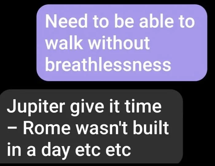 Text message exchange showing autocorrect errors with phrases about breathlessness and Rome not built in a day humor.