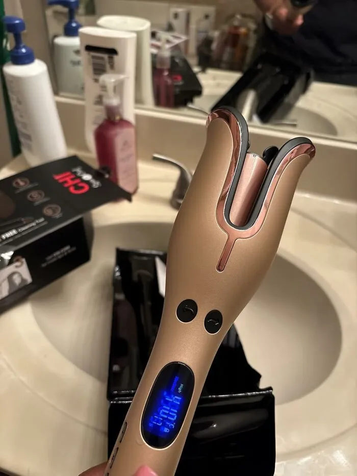 That Awkward, Slightly Singed-Smelling Dance You Do With A Traditional Curling Iron Can Now Be Replaced By The One-Button Magic Of A <a Style="Display:inline;" Href="Https://Www.amazon.com/Chi-Spin-Curl-Special-Curler/Dp/B07vyk8gy9?ie=utf8&th=1&linkcode=ll1&tag=bpgecko-20&linkid=b94687474b3f16df739013a4a4117143&language=en_us&ref_=as_li_ss_tl" Target="_blank">  <span Style="Font: Inherit; Color: #d74b1f;"> Chi Spin N Curl Curling Iron </Span>