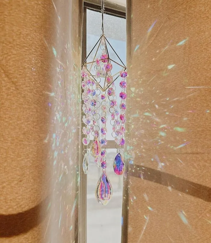 Turn Your Living Room Into A Dazzling Disco Ball Of Rainbows Every Time The Sun Hits Just Right With This <a Style="Display:inline;" Href="Https://Www.amazon.com/Crystal-Suncatchers-Hanging-Suncatcher-Handmade/Dp/B09ht62wr4?ie=utf8&linkcode=ll1&tag=bpbobcat-20&linkid=ae22e9e2d72bd150b855948d2a70852e&language=en_us&ref_=as_li_ss_tl" Target="_blank">  <span Style="Font: Inherit; Color: #d74b1f;"> Crystal Suncatcher </Span>