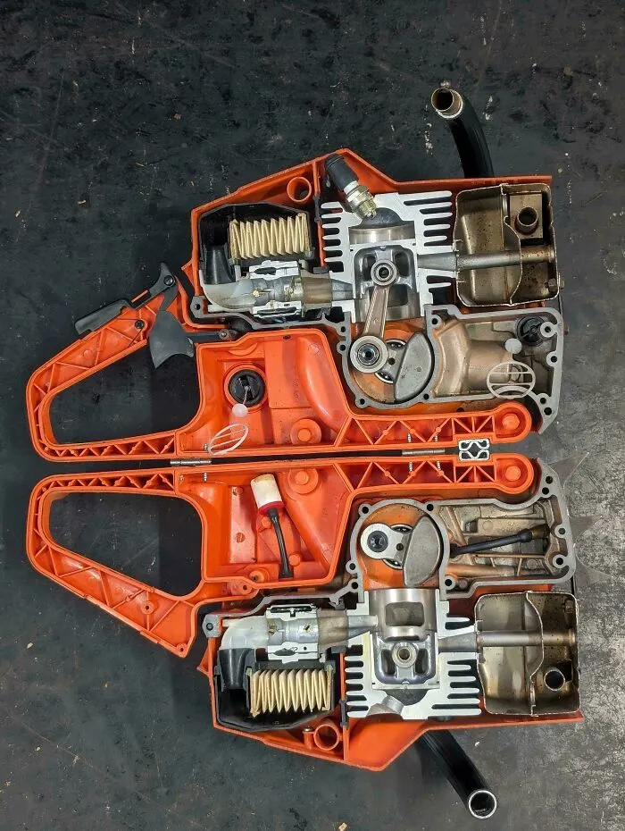 Cross-section of a chainsaw showing detailed insides and mechanical components rarely seen in everyday use.