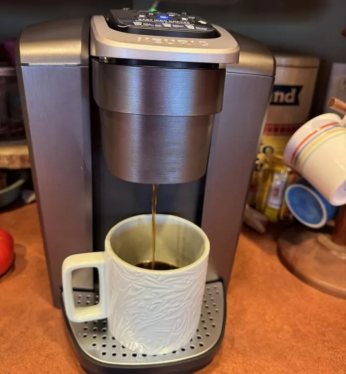 That Bleary-Eyed, Pre-Caffeine Stumble To The Kitchen In The Morning Just Got Significantly Shorter And More Efficient Thanks To A <a Style="Display:inline;" Href="Https://Www.amazon.com/Keurig-K-Elite-Temperature-Capability-Programmable/Dp/B078nn17k3?pf_rd_r=jm3j2jq6ewwc35dagbqb&pf_rd_p=7d7fd1a0-40b8-487f-8db9-B2480f2cfbc8&th=1&linkcode=ll1&tag=bptoucan-20&linkid=d9108fac1fea8c5b3bdc58dad14db855&language=en_us&ref_=as_li_ss_tl" Target="_blank">  <span Style="Font: Inherit; Color: #d74b1f;"> K-Cup Pod Coffee Maker </Span>