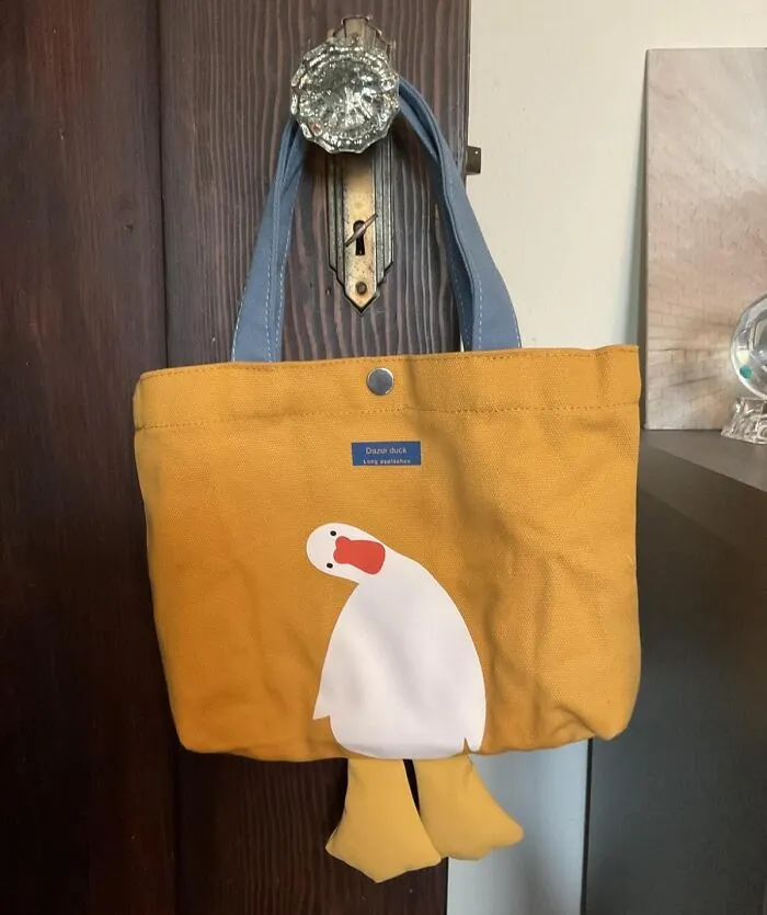 Give Them The Gift Of A Designated "I'm Just Running To The Farmers Market To Buy A Single, Perfect Baguette" Accessory With This <a Style="Display:inline;" Href="Https://Www.amazon.com/Awxzom-Canvas-Graphic-Grocery-Yellow/Dp/B0bl1hx297?ie=utf8&th=1&linkcode=ll1&tag=bpcobra-20&linkid=6e933dfec67562d6b3b601c4d90df1bc&language=en_us&ref_=as_li_ss_tl" Target="_blank">  <span Style="Font: Inherit; Color: #d74b1f;"> Cute Canvas Tote Bag </Span>