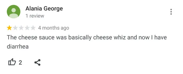 1-star funny and ridiculous review mentioning cheese sauce and diarrhea, showing humorous customer feedback online.