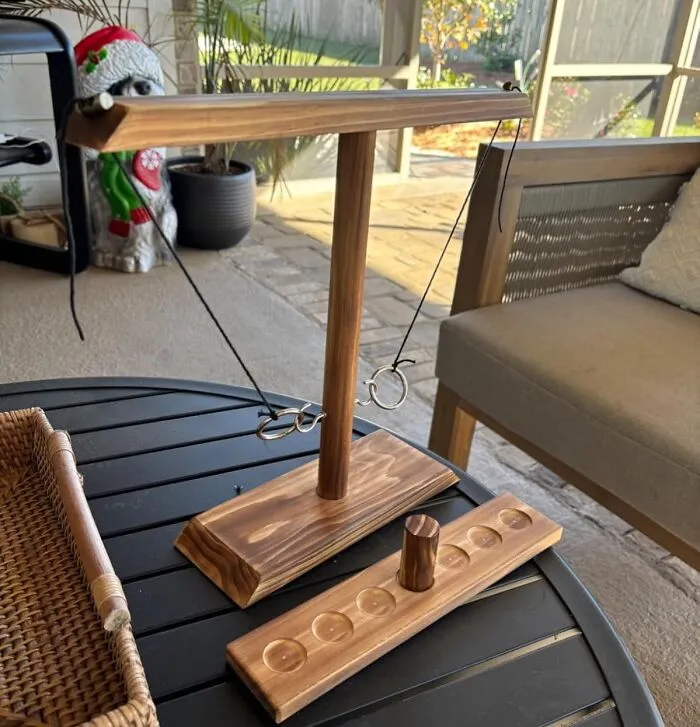 The Only Appropriate Way To Settle A Family Feud Over The Last Slice Of Pumpkin Pie Is With A High-Stakes Tournament Of The <a Style="Display:inline;" Href="Https://Www.amazon.com/Dreamtoyz-Outdoor-Handmade-Fast-Paced-Interactive/Dp/B09qd6lcry?ie=utf8&th=1&linkcode=ll1&tag=bpcrow-20&linkid=272a456fee4ab11e15c94840a66097f6&language=en_us&ref_=as_li_ss_tl" Target="_blank">  <span Style="Font: Inherit; Color: #d74b1f;"> Wooden Hook And Ring Game </Span>
