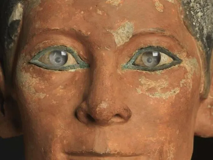 The Hauntingly-Lifelike Eyes Of This 4,500-Year-Old Seated Scribe Are Made From White Magnesite (With Tiny Red Veins!) And Pupils Of Rock Crystal (Saqqara Necropolis, Louvre)