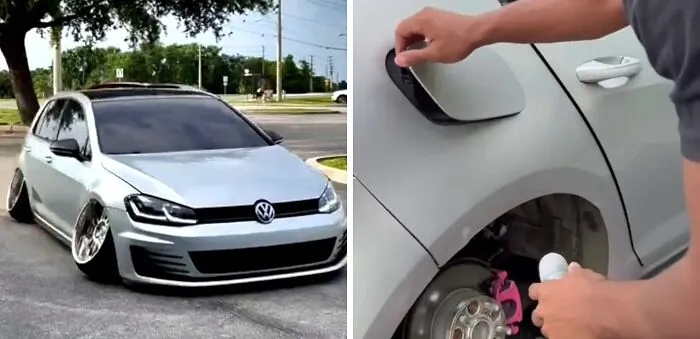 Silver Volkswagen car with extreme camber wheels and a missing front wheel, showing unusual and misguided car modifications.