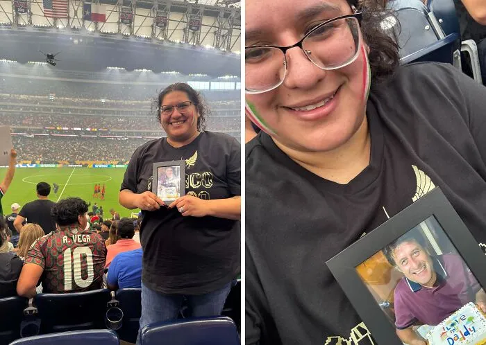 Smiling woman holding a framed photo at a crowded stadium, capturing a wholesome internet moment of connection and joy.