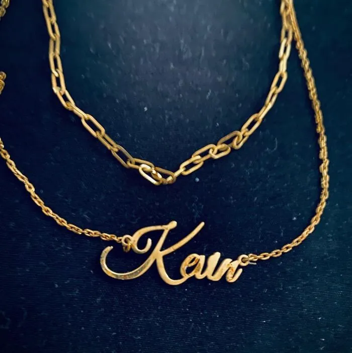 A Very Chic <a Style="Display:inline;" Href="Https://Www.amazon.com/Layered-Necklaces-Personalized-Initial-Bracelets/Dp/B0fjm6rqgk?ie=utf8&th=1&linkcode=ll1&tag=bpdodo-20&linkid=8b64946a33adc9ae464c795f9ec19ca5&language=en_us&ref_=as_li_ss_tl" Target="_blank">   <span Style="Font: Inherit; Color: #d74b1f;"> Custom Name Necklace </Span> That Will Finally Allow Them To Have Their Full Carrie Bradshaw Moment