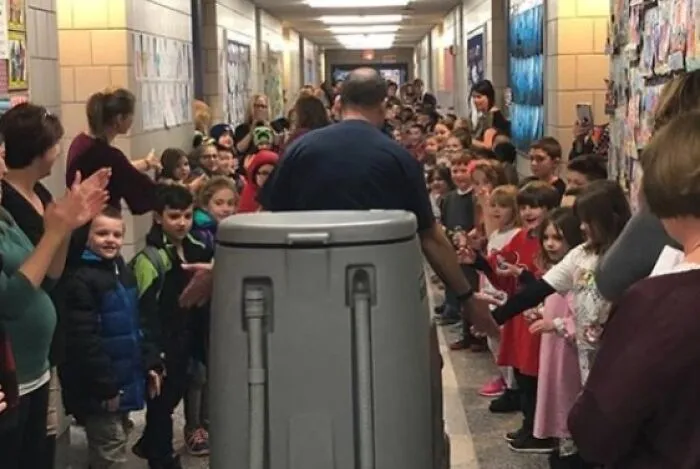 School Holds A One Man Parade For Janitor On His Last Day