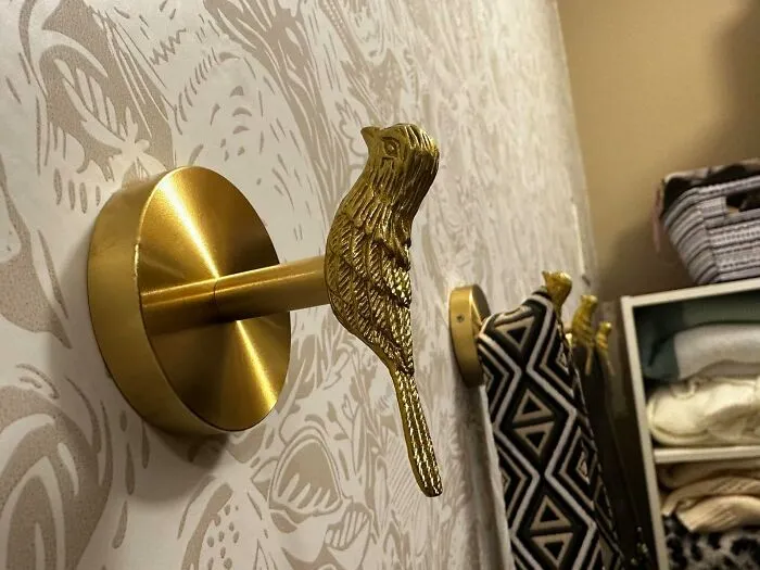 Your Guests' Coats Are About To Feel Like They've Been Personally Selected To Be A Part Of A Wes Anderson Film With A Set Of <a Style="Display:inline;" Href="Https://Www.amazon.com/Meakeo-Wildlife-Vintage-Organizing-Decorative/Dp/B0dc6pr661?ie=utf8&th=1&linkcode=ll1&tag=bptapir-20&linkid=e377883349ff21f8f4deb535e996c565&language=en_us&ref_=as_li_ss_tl" Target="_blank">   <span Style="Font: Inherit; Color: #d74b1f;"> Vintage Brass Bird Wall Hooks </Span>