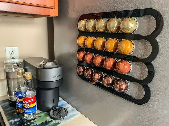 That Awkward Empty Space On The Side Of Your Fridge Is About To Become Your Own Personal Coffee Station With This <a Style="Display:inline;" Href="Https://Www.amazon.com/Coffee-Holder-Nespresso-Vertuo-Capsules/Dp/B08d7zq8y3?ie=utf8&th=1&linkcode=ll1&tag=bphamster-20&linkid=738b105717c954a5b721d925584d3bd6&language=en_us&ref_=as_li_ss_tl" Target="_blank">  <span Style="Font: Inherit; Color: #d74b1f;"> Magnetic Coffee Pod Holder </Span>