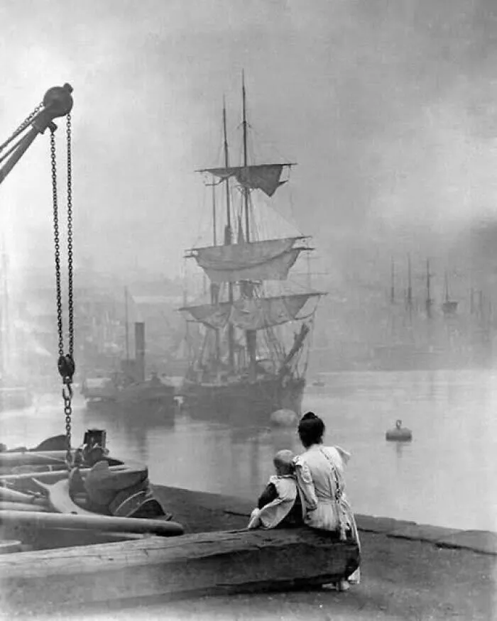 Mother And Daughter Watching A Tall Ship On The River Thames In London Around 1880. Absent But Dear