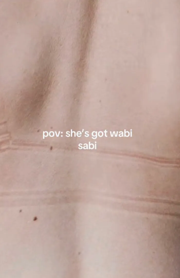 Close-up of skin showing natural marks and imperfections celebrating perfect imperfections trend.