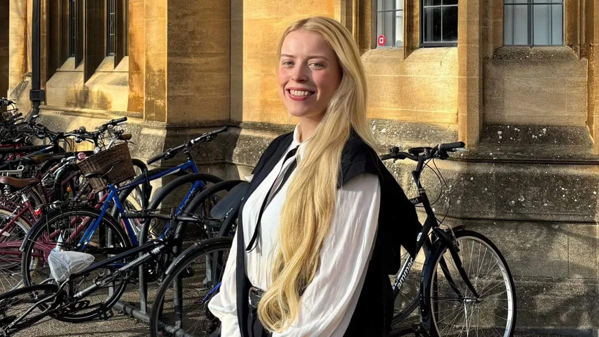 Woman Celebrating Her PhD Delivers Savage Response To Male Criticism, Internet Joins In