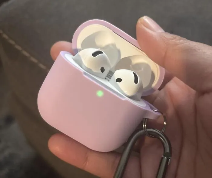 A Pair Of <a Style="Display:inline;" Href="Https://Www.amazon.com/Apple-Bluetooth-Headphones-Personalized-Effortless/Dp/B0dghmnq5z?ie=utf8&linkcode=ll1&tag=bpraccoon-20&linkid=de7ddc45d68cdd58bc683492c1f1450d&language=en_us&ref_=as_li_ss_tl" Target="_blank">   <span Style="Font: Inherit; Color: #d74b1f;"> Apple AirPods 4 </Span> Is The Universal Sign For "I Am Busy, Important, And Actively Ignoring The World Around Me, So Please Do Not Perceive Me"