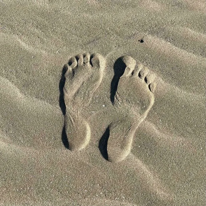 The Feet Are Pressed In The Sand, Not Sculpted