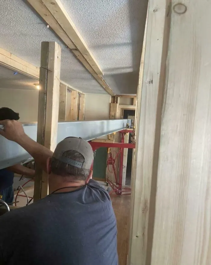 Raising A 12 Foot 900lb Steel Beam 9 Feet High With Two Drywall Jacks Rated For 150lb