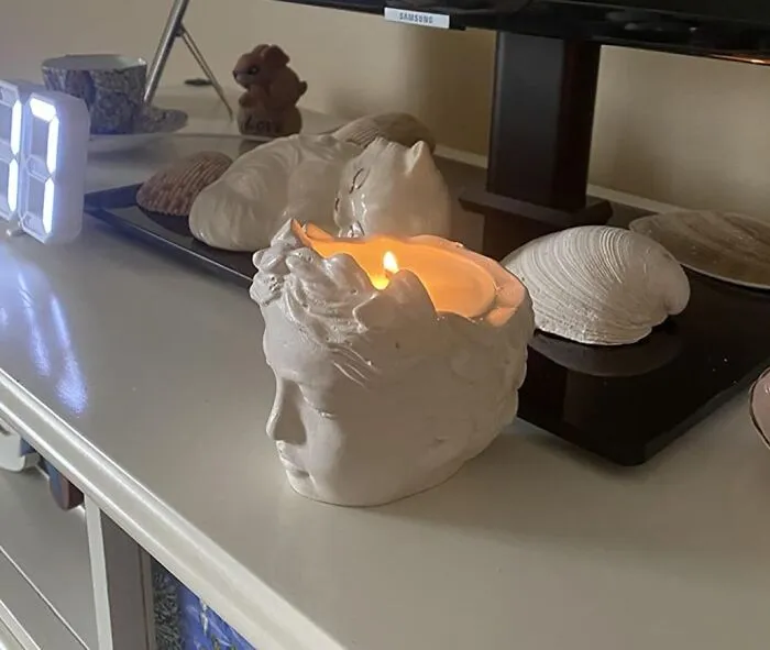 A <a Style="Display:inline;" Href="Https://Www.amazon.com/Lavender-Handcrafted-Sculpture-Creative-Anniversary/Dp/B0ct96qbbd?ie=utf8&th=1&linkcode=ll1&tag=bpantelope-20&linkid=cc8a582b9c365beb249c9ab728505d53&language=en_us&ref_=as_li_ss_tl" Target="_blank">   <span Style="Font: Inherit; Color: #d74b1f;"> Greek Bust Candle With Wood Wick </Span> Will Bring A Touch Of Classical Tragedy To Any Room As It Slowly Weeps Hot Wax Tears Down Its Own Stunning Face