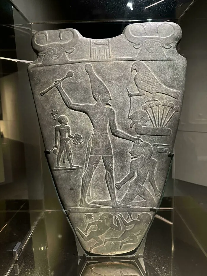 Ancient Egyptian stone relief depicting figures and hieroglyphs, an incredible photograph from ancient Egypt history.