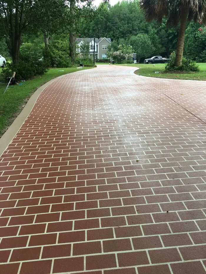 Driveway I Just Finished Working On. I Do Decorative Concrete Work For A Living. 3655 Square Feet Total. Almost A 1/4 Mile Long In Length