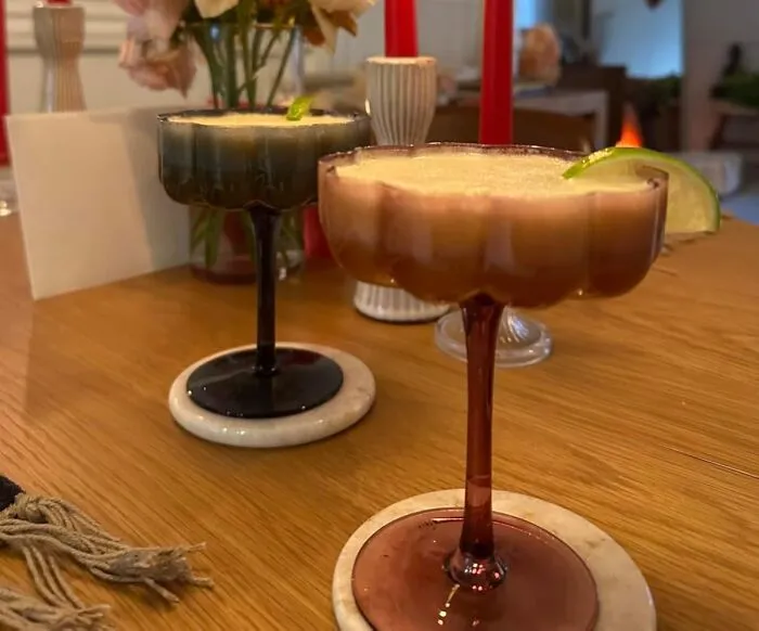 A Set Of <a Style="Display:inline;" Href="Https://Www.amazon.com/Flower-Vintage-Martini-Champagne-Cocktail/Dp/B0crch915r?ie=utf8&th=1&linkcode=ll1&tag=bpalpaca-20&linkid=5325da9ef1d98436e2e976440c2605e5&language=en_us&ref_=as_li_ss_tl" Target="_blank">   <span Style="Font: Inherit; Color: #d74b1f;"> Scalloped Classic Champagne Glasses </Span> Will Make Every Glass Of Bubbly Feel Less Like A Casual Beverage And More Like A Fancy, Five-Star "We're-So-Glad-You're-Part-Of-The-Family" Toast