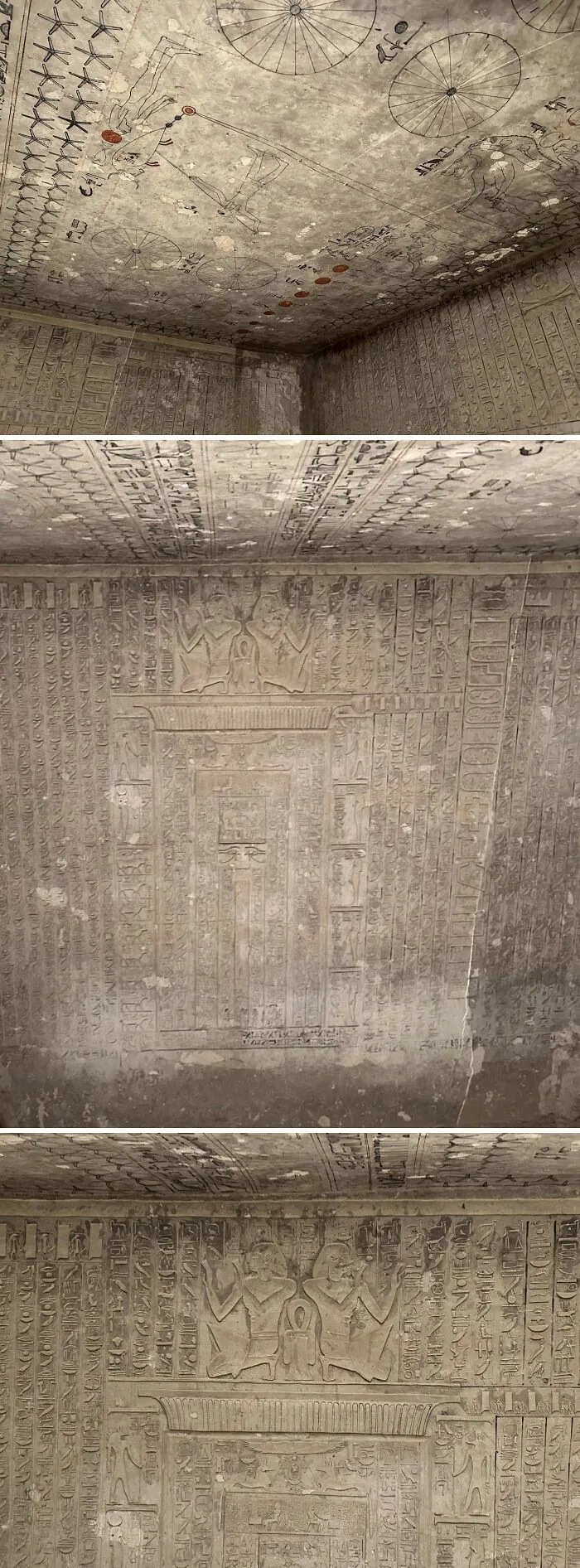 Ancient Egypt hieroglyphs carved on tomb walls and ceiling depicting celestial and religious scenes.