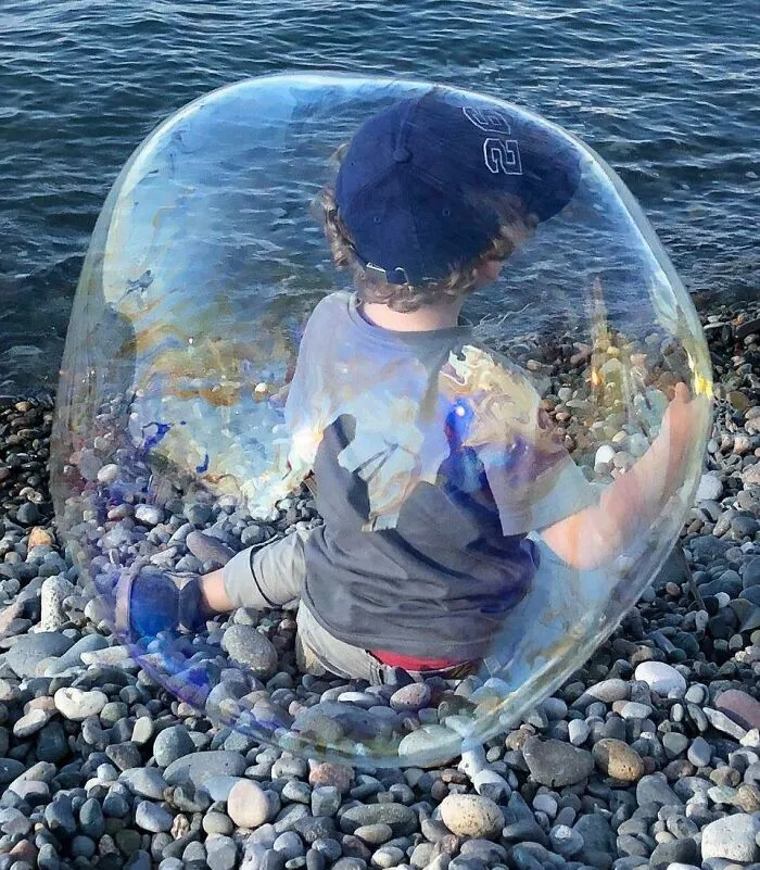 Managed Perfect Timing While Soap Bubbles Flown Between Camera And Kiddo
