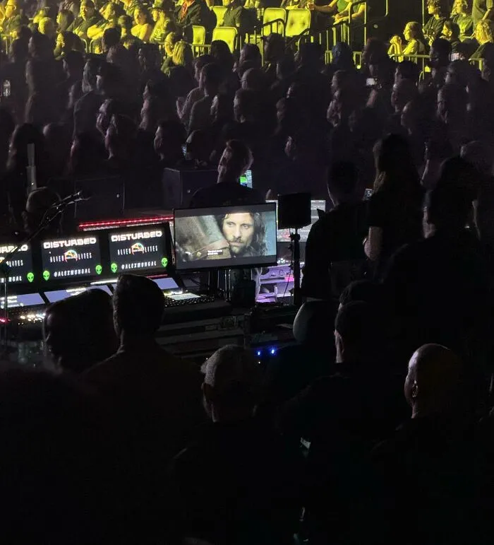 Technical Crew Watching Lord Of The Rings During A Disturbed Concert