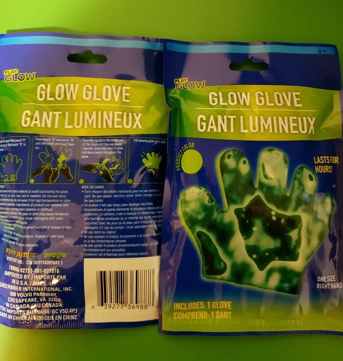 Packaging of a bizarre glow glove Christmas gift, featuring neon green color and instructions for use on a blue and green background.