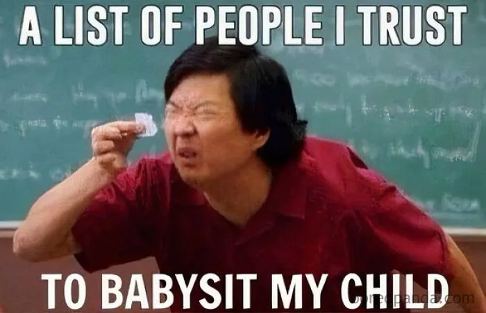 Man squinting at small paper, humorously illustrating relatable memes for parents going through challenging moments.