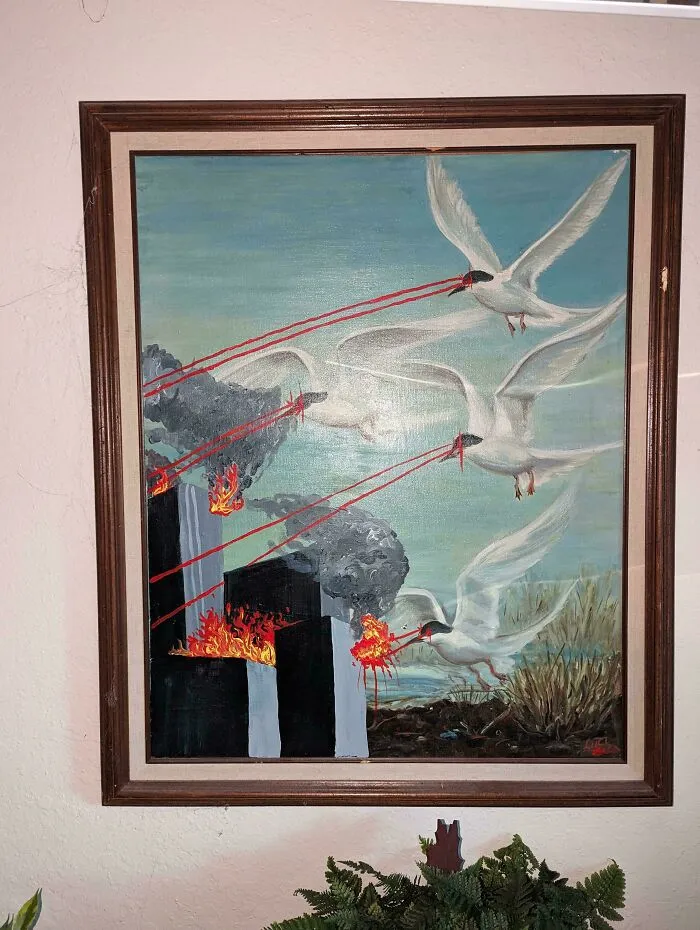Thrifted painting personalized with birds shooting laser beams from eyes causing fires on buildings.