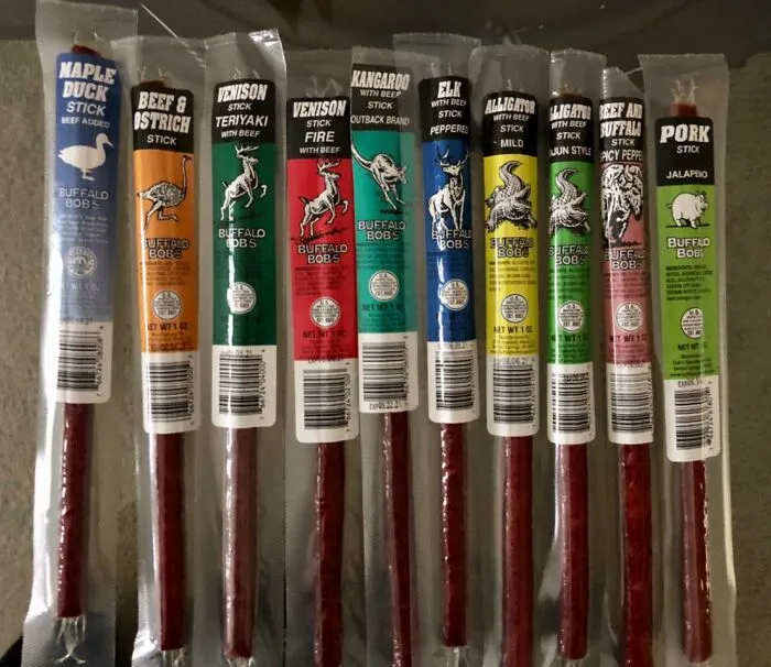 Telling People You Ate An Alligator For Lunch Is A Weird Flex But Totally Possible With The <a Style="Display:inline;" Href="Https://Www.amazon.com/Jerky-N-Spice-Variety-Venison-Alligator-Assorted/Dp/B01atw6nj0?ie=utf8&th=1&linkcode=ll1&tag=bpcoyote-20&linkid=969a4571a8255c32479ea6a2384c7445&language=en_us&ref_=as_li_ss_tl" Target="_blank">   <span Style="Font: Inherit; Color: #d74b1f;"> Wild Game Exotic Meat Sticks </Span> And Their Variety Of Strange Proteins