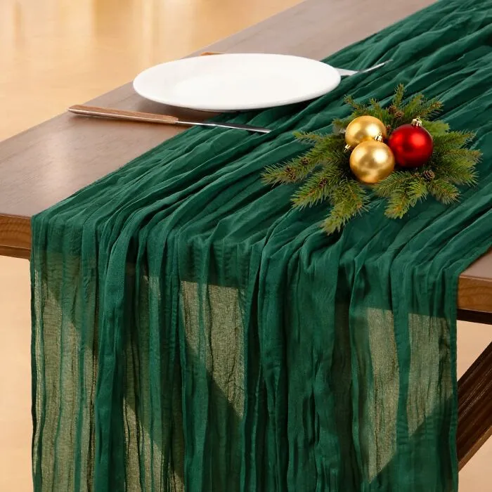 This <a Style="Display:inline;" Href="​​https://Www.amazon.com/Socomi-Cheesecloth-Table-Runner-Tablecloth/Dp/B09wy2t684?crid=cihvtdc81lxx&dib=eyj2ijoimsj9.io9qmcksbnzxvdrtjwjoxvictxy-Rdetdtxgiiexabp7xr1ep2q7_umssbfnj6ufrsymj24qnvyid_f1ddnoi3nreu3mg0unirxtfpyywwgwlihzfgm4xiwvpk6adipxpd_3mn65-Zkc43ofcx17ghvwjwyvhzmzutojwd3pjmewbryvu2cojx6f2r1nxm3wyypwu7jwwgureg_u8it_nbi4hyimhmomwul1mksj-_gskxrgkebsz2wsths6m8uscit5eejzljfvoth4ktlaygqwtt2qzqt_d87jkmnjlua.im0ae8o42xpoeywr3wa1sfr7jz9-Dmhtjtmt11x4w0g&dib_tag=se&keywords=christmas%2bhosting%2bessentials&qid=1765528754&sprefix=christmas%2bhosting%2caps%2c214&sr=8-16&th=1&linkcode=ll1&tag=bpwolf-20&linkid=a3f4e3307c4d1d0bf54273689b5ee50d&language=en_us&ref_=as_li_ss_tl" Target="_blank">   <span Style="Font: Inherit; Color: #d74b1f;"> Green Gauze Table Runner </Span> Adds A Whisper Of Color And Texture That Complements Any Christmas Theme