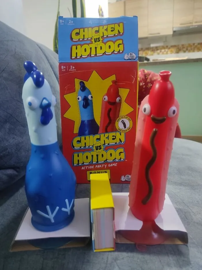The Eternal, High-Stakes Question Of "Who Would Win In A Fight, A Chicken Or A Hotdog?" Can Now Be Answered With The Chaotic, Slightly Absurd, And Deeply Hilarious <a Style="Display:inline;" Href="Https://Www.amazon.com/Big-Potato-Chicken-Hotdog-Flipping-Fun/Dp/B0d9hm75pp?ie=utf8&th=1&linkcode=ll1&tag=bpoctopus-20&linkid=0ef079cea873fdc16ad3551440b9f8d5&language=en_us&ref_=as_li_ss_tl" Target="_blank">   <span Style="Font: Inherit; Color: #d74b1f;"> Chicken vs. Hotdog Game </Span>
