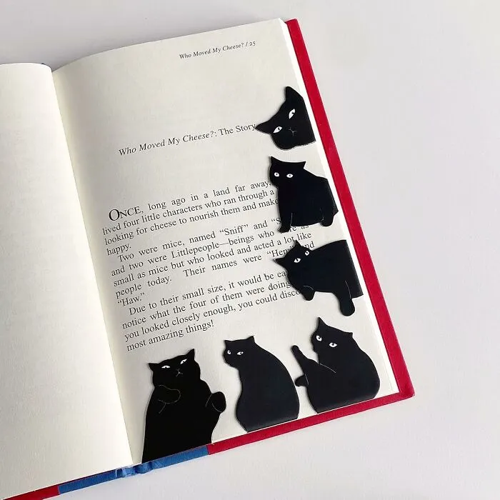 A Set Of <span Style="Font: Inherit; Color: #d74b1f;"> Magnetic Cat Bookmarks </Span> Will Judge You Silently, But Adorably, For Taking Three Weeks To Read A Single Chapter Of That Book You Swore You'd Finish This Year