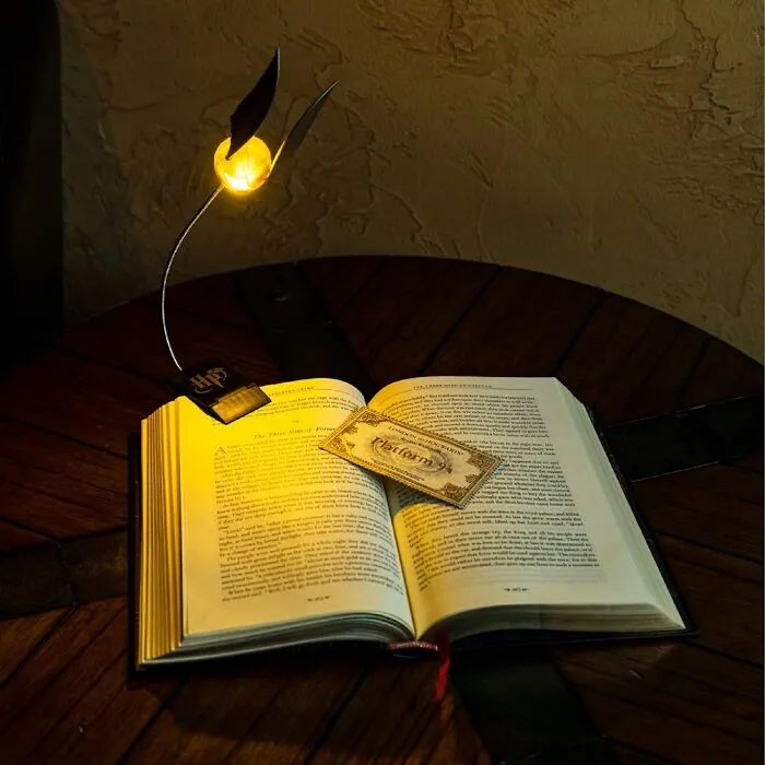 There Is Only One Way To Read Harry Potter For The Tenth Time And Thats Under The Golden Glow Of This <a Style="Display:inline;" Href="Https://Www.amazon.com/Paladone-Potter-Officially-Licensed-Merchandise/Dp/B07rd5h39b?pf_rd_p=0853aa70-D404-433f-9f00-F9ee78d7d25b&pf_rd_r=bp6pd4wab4wys6nfwdgf&sr=1-5-21849463-A45b-4302-A93c-20c71917b5a3&linkcode=ll1&tag=bppelican-20&linkid=96ebfafef7d053fdfa225ca12a220954&language=en_us&ref_=as_li_ss_tl" Target="_blank">  <span Style="Font: Inherit; Color: #d74b1f;"> Snitch Reading Light </Span> 